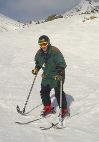 4 track skiing using skis and outriggers